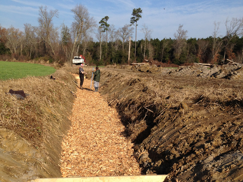 Construction of bioreactor in Chesapeake Bay area.