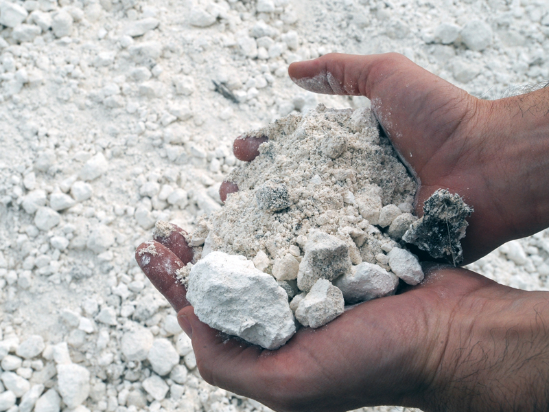 hands holding gypsum