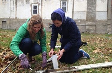 students taking soil cores