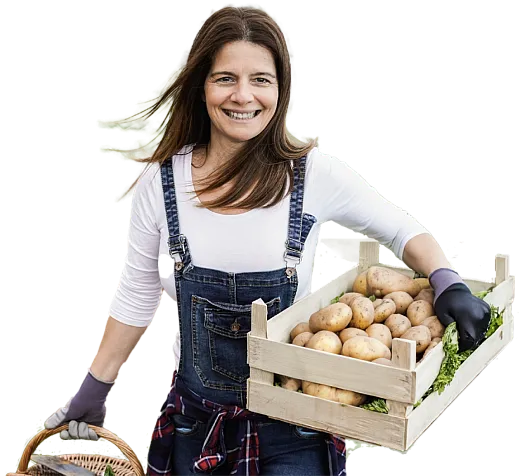 Woman holding a box of potatoes